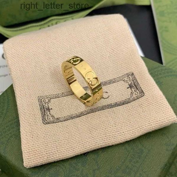 Luxurys anel de prego masculino designer de titânio gravado carta padrão designer anel de noivado tamanho feminino atacado 240229
