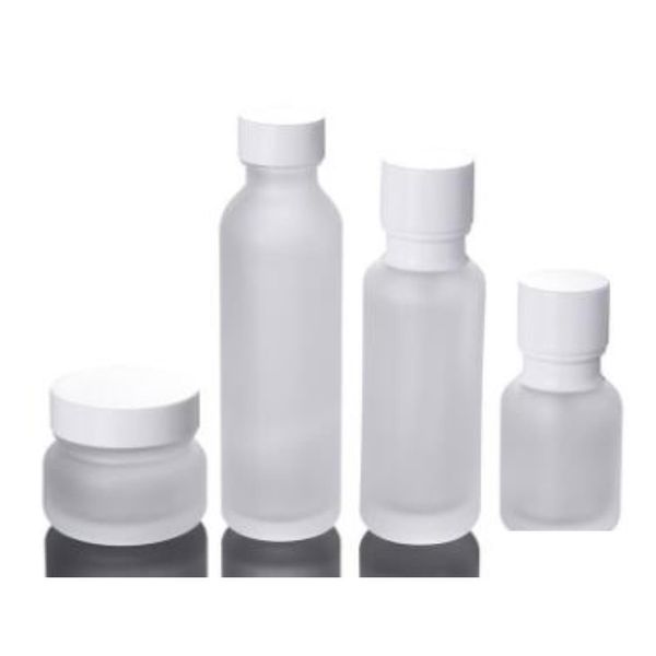 Verpackungsflaschen Großhandel Verpackungsflaschen Milchglasglas Lotion Creme Runde Kosmetikdosen Handgesichtspumpflasche mit Holzmaserung C Dhcnq