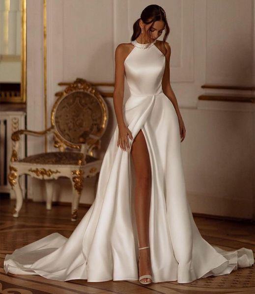 Abiti da sposa eleganti lunghi in raso con perline e tasche con tasche A-Line senza maniche in avorio con strascico Abito da sposa con fiocco Vestido de novia Abiti da donna