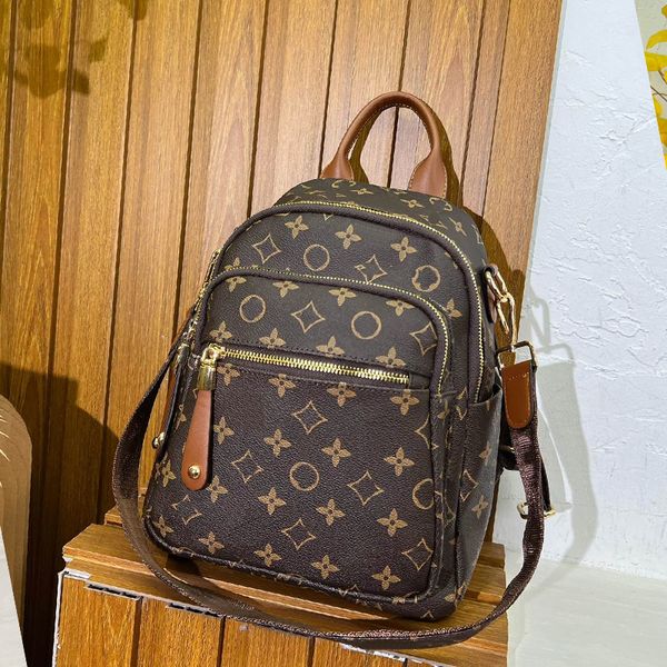 Mulheres designer mochila estilo sacos de lona couro quente na moda senhora luxo mochilas saco ao ar livre menina moda bagagem clássico casual sacos de ombro