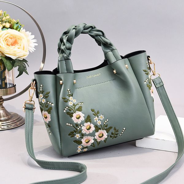 Bolsa de ombro para mulheres vendas de fábrica 8 bolsa de bordado de flores elegantes diariamente bolsa de couro de cor sólida deste ano bolsas de tecido 0626#