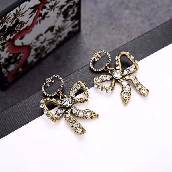 2023 Designer Charm Bogen Ohrringe für Frauen neue Mode Ohrring Damen Retro Kupfer alten Stil Hochzeit Party Geschenk G2309919PE-3