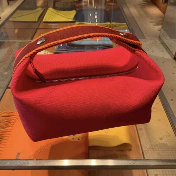 Bolsa de cosméticos de designer de alta qualidade Bolsa feminina lancheira Bolsa de lona de design de moda bolsa de higiene pessoal de mão Bolsa bento portátil de grande capacidade