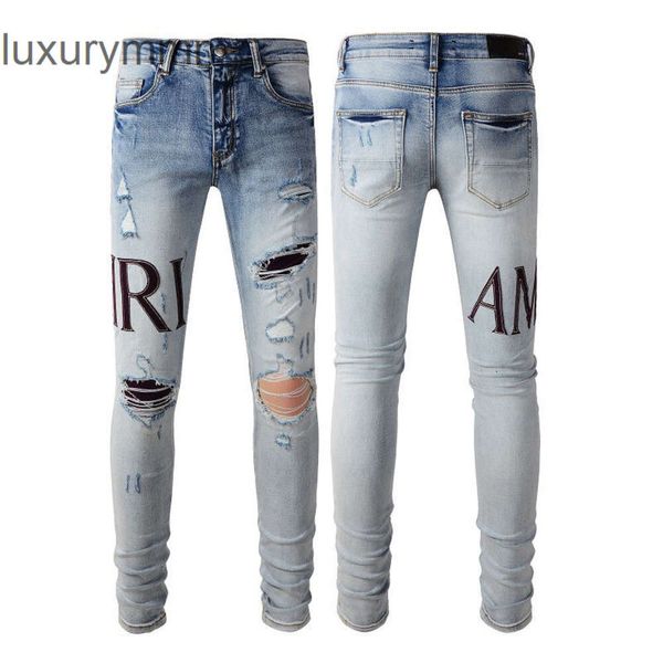 Denim Amiryes Jeans Designer Pantaloni Uomo Uomo Jean Marchio di moda autonomo in pelle toppa con fori leggings lavati e aderenti jeans da uomo high street 5WBT