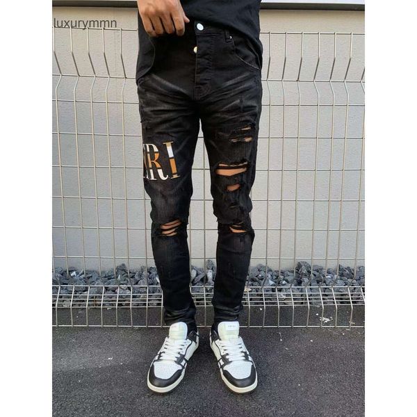 Denim Amiryes Jeans Designer Pantaloni Uomo Uomo Jean Autunno e Inverno Uomo Slim Fit Perforato 2022 Nuova Primavera di mezza età CJWT