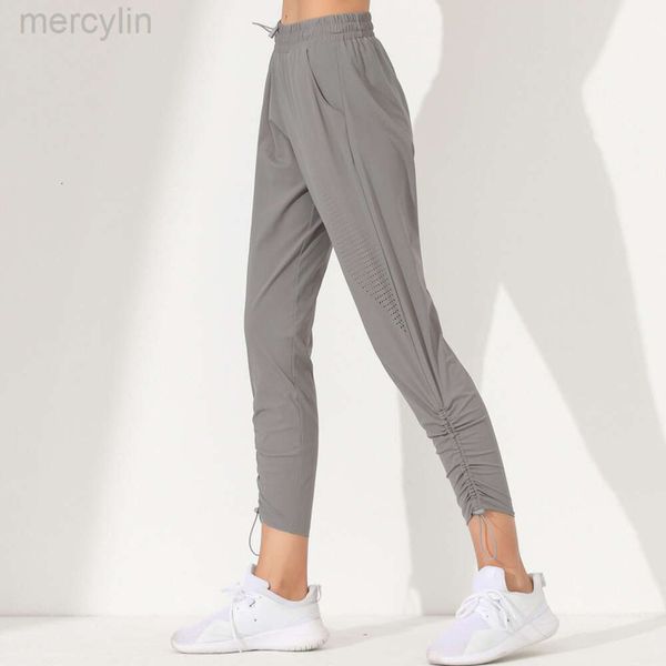 Designer Aloo Pant Origin Yoga Sports Fitness Casu Calças de ioga encolhem os pés de renda para subir mulheres de bolso ao ar livre