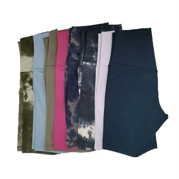 Shorts esportivos de cor sólida Calças de ioga de cintura alta Slim Fit Calça de moletom casual sem linha T Calças apertadas elásticas Mulheres Nake Feeling Three-P3137