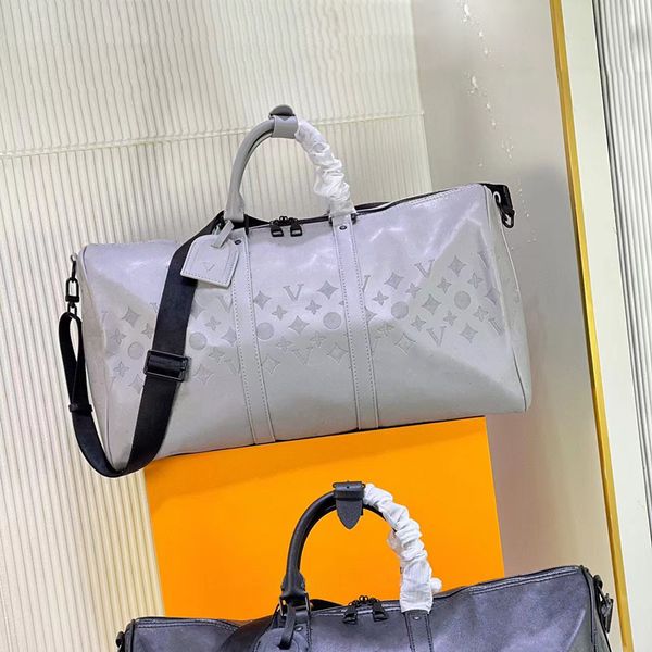 Homens duffle bag mulheres sacos de viagem designer saco de bagagem de luxo designer bolsa de couro dos homens bolsas de bagagem tote ao ar livre grande saco de corpo cruzado totes keepall 50