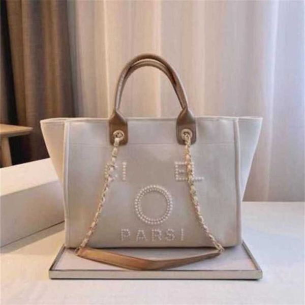 Barato 80% de desconto feminino clássico luxo mão lona bolsa de praia bolsas grandes mochilas capacidade pequena corrente pacotes grande crossbody 4XQ4 XM1A código 561