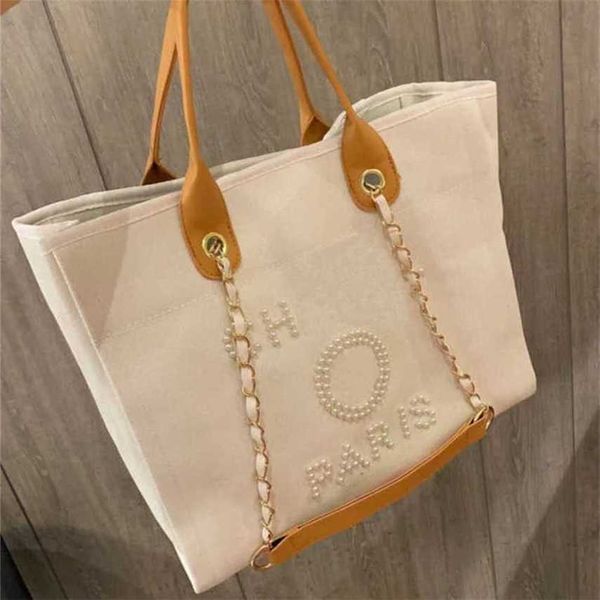 Barato 80% de desconto Bolsa de praia de lona de mão feminina de luxo Bolsas clássicas grandes mochilas capacidade pequena corrente pacotes grande crossbody código ZORW 561