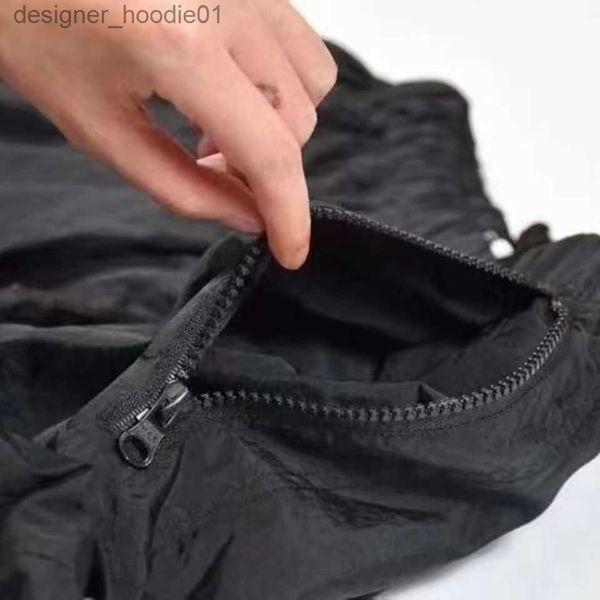 Мужские брюки, дизайнерские брюки, каменный металл, нейлоновый карман с вышитым значком, повседневные брюки, брендовые тонкие светоотражающие островные брюки, размер M-2XL L23091