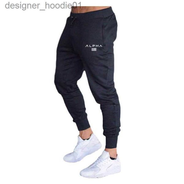 Herrenhosen Herren Designer Joggers Fitnessstudios Herrenhosen lässig elastische Muskel -Baumwoll -Männer Fitness -Training dünne Jogginghosen Hosen Jogger Bodybuilding Kleidung L230915