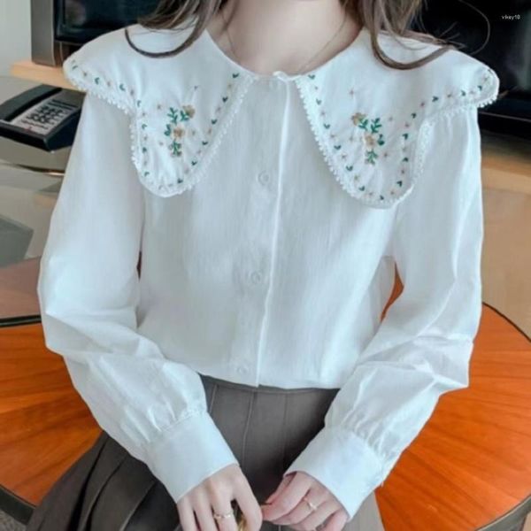 Camicette da donna Camicia bianca a maniche lunghe con collo a bambola con ricamo francese per le donne 2023 Camicetta con design autunnale da donna Dolce Tutto abbinato Top Trend