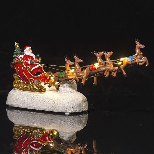 Decorazioni natalizie Innodept12 Assortimento di slitta di Babbo Natale e renne Accessori per decorazioni natalizie Luce LED musicale Collezione natalizia Figurina 230920