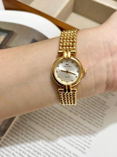 Armbanduhren Luxus Perlenarmband Design Damenuhr Temperament Lässige Mode Gold Retro Nischenquarz