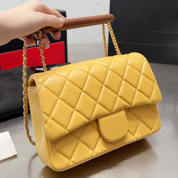 En Kaliteli Çantalar Tasarımcı Moda Crossbody Bags Omuz Tote Çanta Marka Kadın Çanta Ünlü Flep Zincir Cüzdan Ahşap Düz Tutar Sırt Çantası Ünlü Marka Çanta