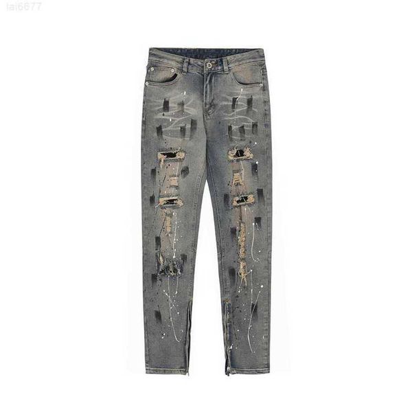 High Street Wind Blown Hole Patch Made Old Speckled Ink Slim Fit Jeans mit kleinem Fuß und seitlichem Reißverschluss