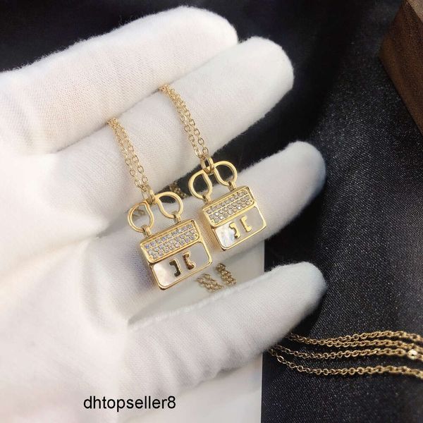 Colares de designer de luxo para mulheres com pingente de diamante correntes assimétricas correntes de marca popular colar moda banhado a ouro cadeia longa CNC processcate