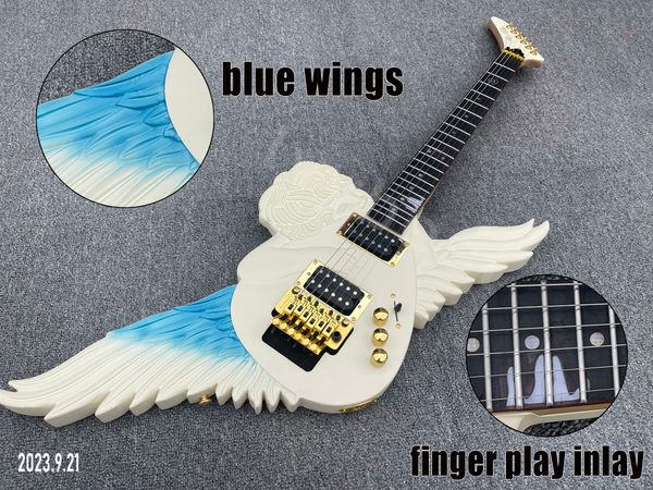 Chitarra elettrica colore bianco crema sottile blu bianco ali tastiera in palissandro punti intarsio parti dorate Pickup HH tremolo rock