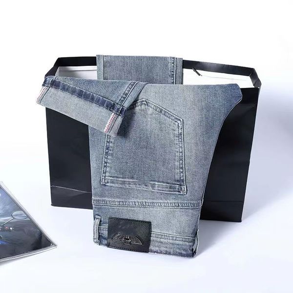 Jeans classici da uomo firmati Jeans skinny azzurri Pantaloni elasticizzati a gamba dritta di fascia alta casual classici alla moda con piedi sottili