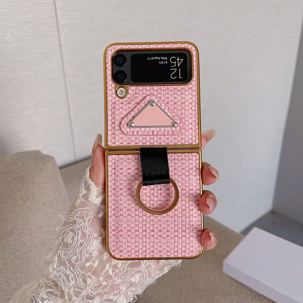 Custodie per Samsung Galaxy Z Flip 4 3 Cover per cellulare di design con motivo a trama in pelle PU Cromata di lusso Custodia per paraurti posteriore con cinturino Cordino Porta anello per dito Fundas Shell Rosa