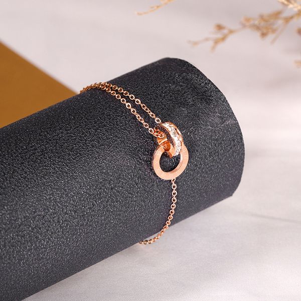 Chiusura con numeri romani europei e americani alla moda, doppio anello circolare, bracciale a catena in oro rosa, classico bracciale in acciaio al titanio in stile minimalista