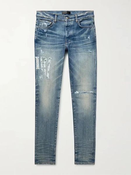 Jeans masculinos 2023 primavera design angustiado streetwear moda magro letras padrão retalhos danificado rasgado azul