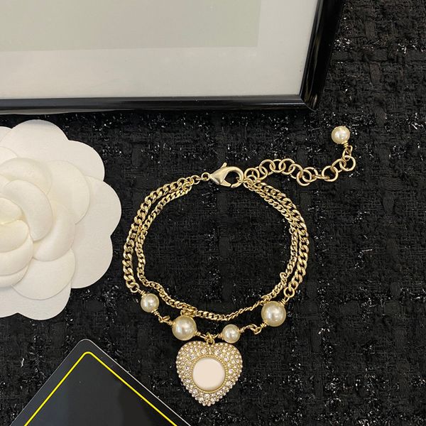 Charme de luxo feminino jóias pulseira de ouro requintado pérola em forma de coração combinando diamante inlay design elegante e lindo designer magnífico senhora pulseira