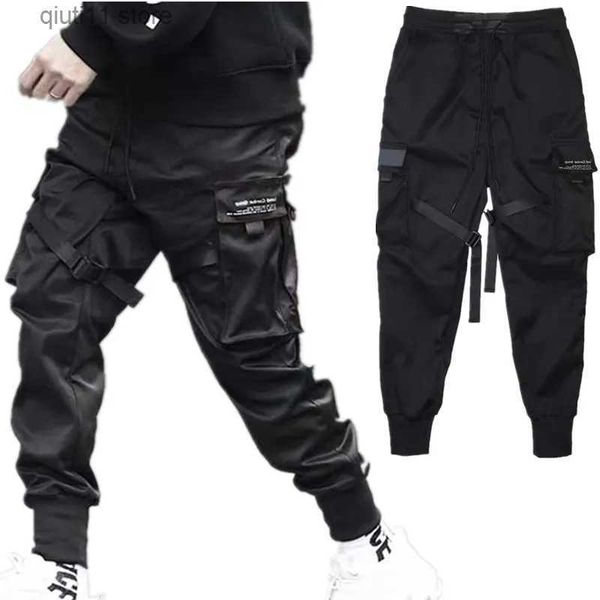 Pantaloni da uomo Hip Hop Boy Pantaloni da pista Elastico in vita Harem Pant Uomo Streetwear Punk Nastri Design Pantaloni Uomo Pantalone nero Tasche Pantaloni da jogging T230928