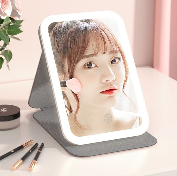 En son 20.2x13.8cm Lighted Vanity Aynası LED Makyaj Aynası Üç renkli şarj ile Özelleştirilmiş Logo için Birçok Renk Seçenekleri Desteği