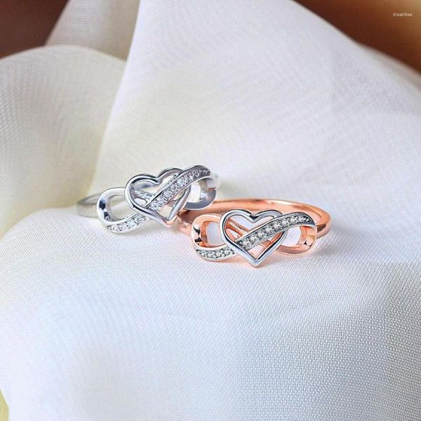 Fedi nuziali Classico anello a cuore infinito Elegante cristallo zircone cavo Affascinante fidanzamento nuziale Regali per amanti Gioielli da donna