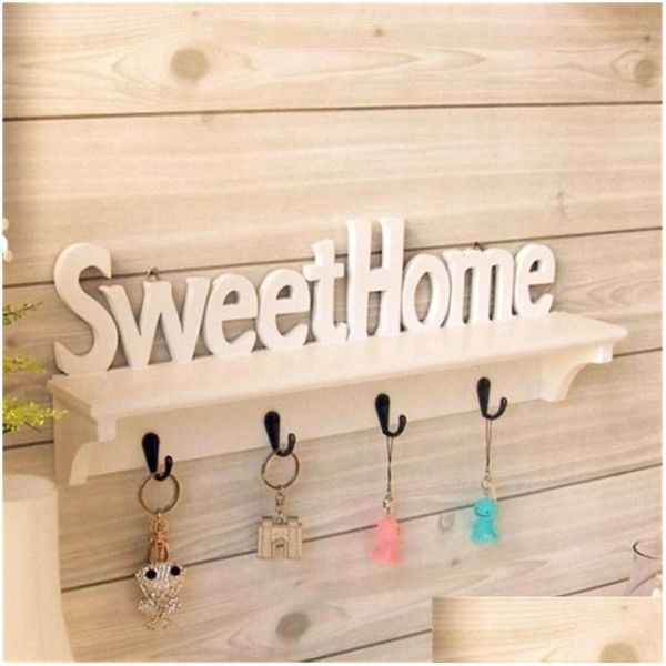 Soportes de almacenamiento Bastidores 1Pc Sweet Home Words 4 Ganchos Shees Sombrero Estante para llaves Colgando Montado en la pared Titular de bastidor Y200429 Drop Delivery Gard Dhcdh