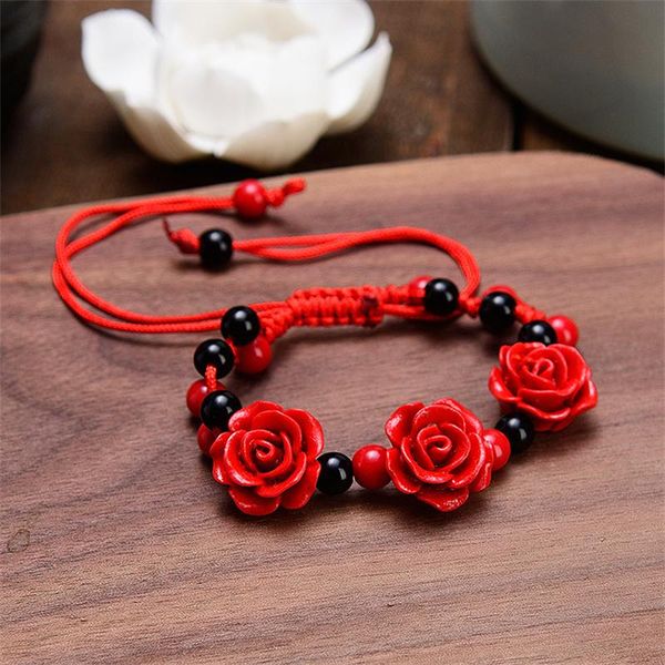 Strand Fili di perline Bracciale da donna fatto a mano con rosa Artigianato etnico Lacca Fiore di cinabro intagliato per corda rossa