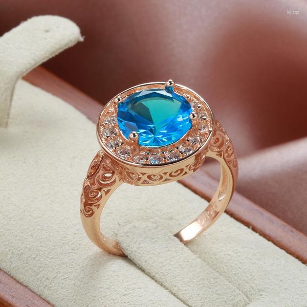Rings de cluster zircão azul de luxo para mulheres 585 Rose Gold Circle White Spire Hollow Glossy Wedding Party Jóias Incomuns