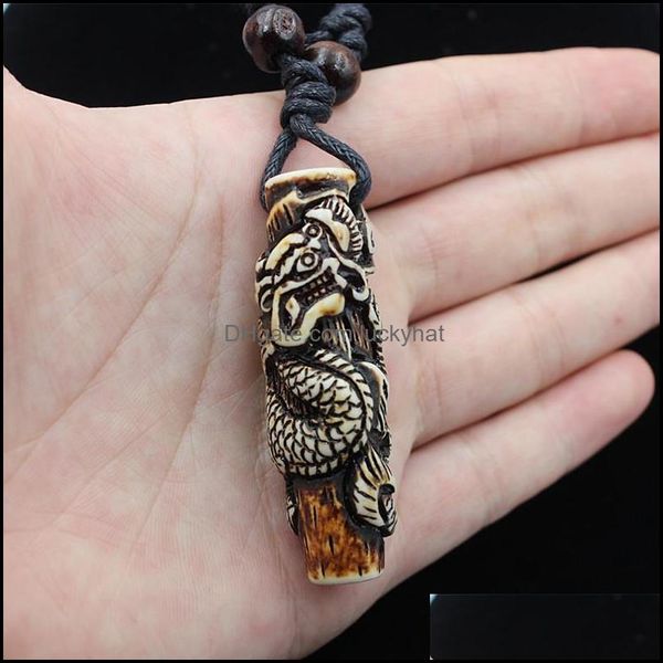 Andere benutzerdefinierte coole Simation Knochenschnitzer Totem Drache Anhänger Holzperlen Amet Halskette Glücksgeschenk -Drop -Lieferung Schmuck Halsketten pendieren otytm