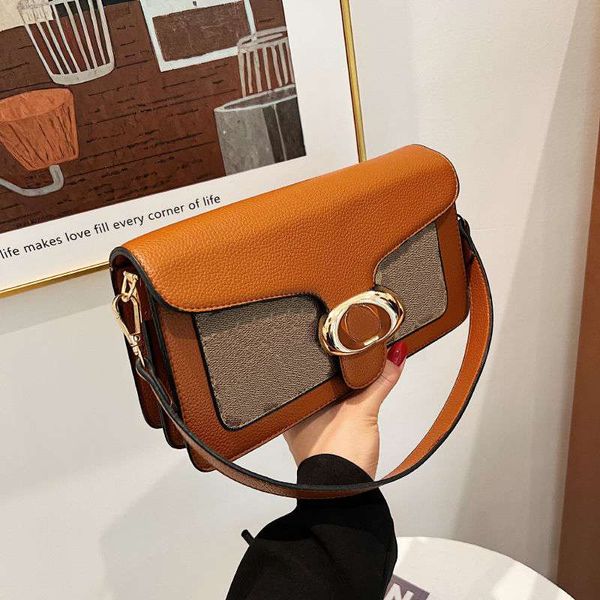 Tasarımcı modası Klasik jakarlı kumaş StylePolished çakıl taneli deri Tabby 26 omuz çantası Altın tonlu Logo Yazısı yüksek kaliteli koltuk altı çantaları