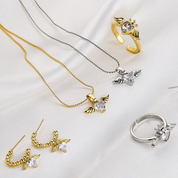 Set di orecchini e collana HECHENG Anello con pendente a cuore con ala d'angelo adorabile per le donne Gioielli con zirconi dolci