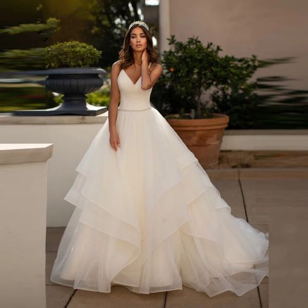 Abiti da sposa senza maniche in tulle moderno e semplice con scollo a V per la sposa Abito da sposa per occasioni formali con perline incrociate sul retro