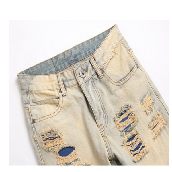 Jeans da uomo Designer designer di lusso da uomo di lusso Pantalone da uomo slim fit elastico ricamo moda stile jean baffo di gatto sbiancante jeans denim con buco rotto da uomo