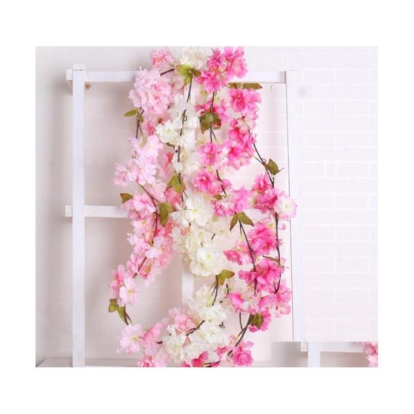 Flores decorativas grinaldas Arco de casamento de seda artificial Fake Sakura Pl￡stico Videira pendurada Garland Blossom Pipe Home Tipe Dhgko