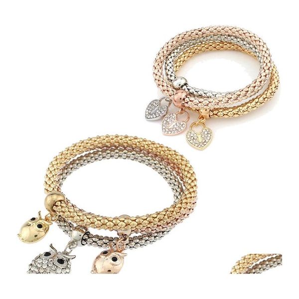 Braccialetti con ciondoli Gioielli di moda 3 pezzi Set barra di cristallo elastica tricolore con impostazione braccialetto da donna gufo cuore per braccialetto Drop Deliver Ot7Ob