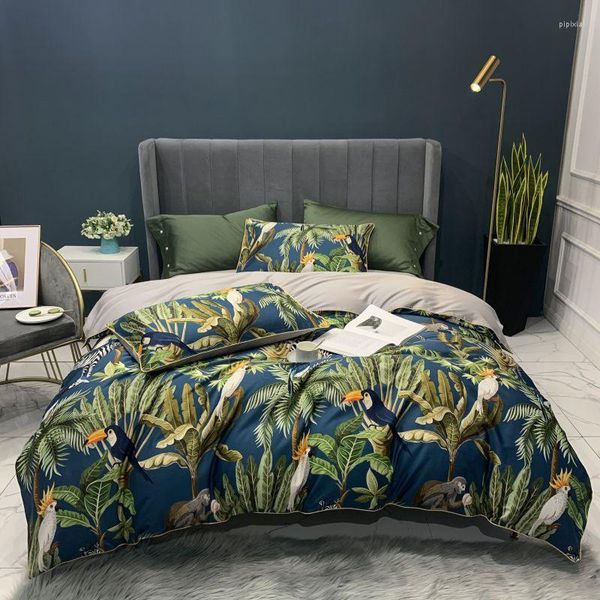 Bedding define tecido de fundo azul escuro com plantas tropicais verdes e folhas de estampa de pássaros de tucano 4pcs egípcio cetim de cama de algodão egípcio cetim