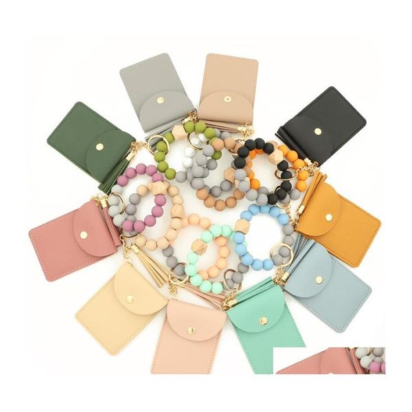 Party Favor Ups Sile Bead Armband Einfarbige Kartentasche Schlüsselanhänger Brieftasche Leder Quaste MTI Slot Change Drop Lieferung Home Garden Fe Dhgin