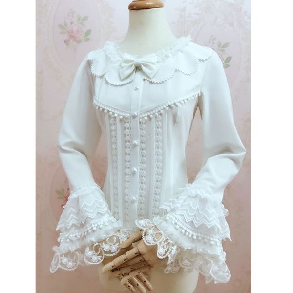 Maglietta da donna Splendida stile retrò femminile Lolita Camicetta bianca Dolce camicia a maniche lunghe a campana con nappe 230131