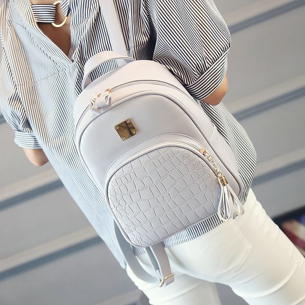 Mochila escolar sólida feminina adolescente mochila formal pequena borla para pacote de estilo feminino mochila de couro viagem meninas 230801
