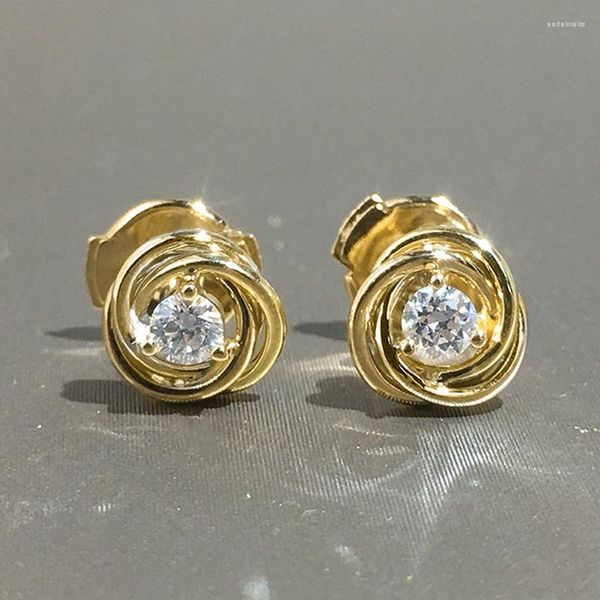 Orecchini Huitan in metallo color oro con design a spirale orecchino con singolo CZ gioielli da piercing all'orecchio semplici e versatili da donna