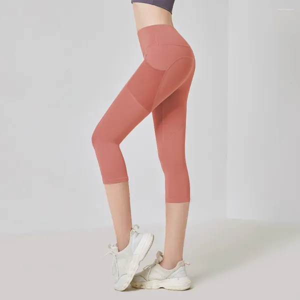 Leggings da donna Vita alta Hip Lift Capris Fitness Sport Tasca in rete Yoga Collant solidi Pantaloni per la moda femminile