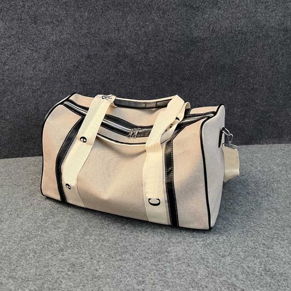 cho büyük kapasiteli seyahat çantası unisex hafta sonu çanta tasarımcısı duffle çantaları moda marka mektubu baskı el tipi büyük çanta banliyö bagajı 230715