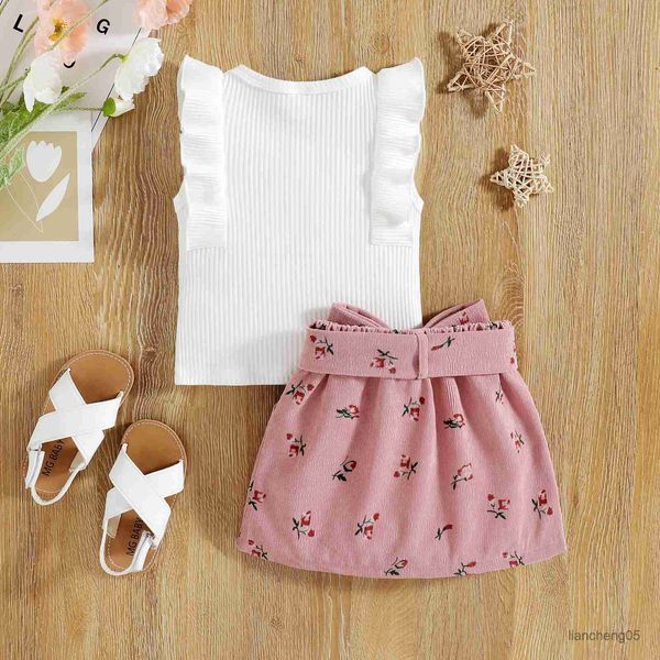 Малышка для маленьких девочек 2PCS Set Set Set Set Stepless Ruffle Tops Рубашка с цветочным поясом для талии короткая юбка для малышей летние наряды R230805