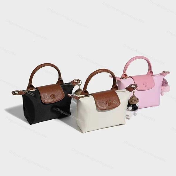 Tasche Hohe 2024 Qualität Clearance Dumpling Großhandel Großhandel Schultergurt Brieftasche Nylon Kurzer Griff Hand Kontrast Kosmetik Cognac Farbe Hand Mini Handtasche